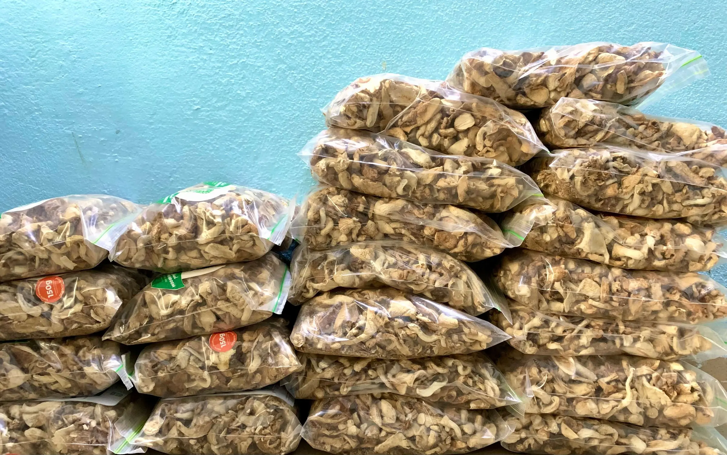 Packs of dried mushrooms stacked high