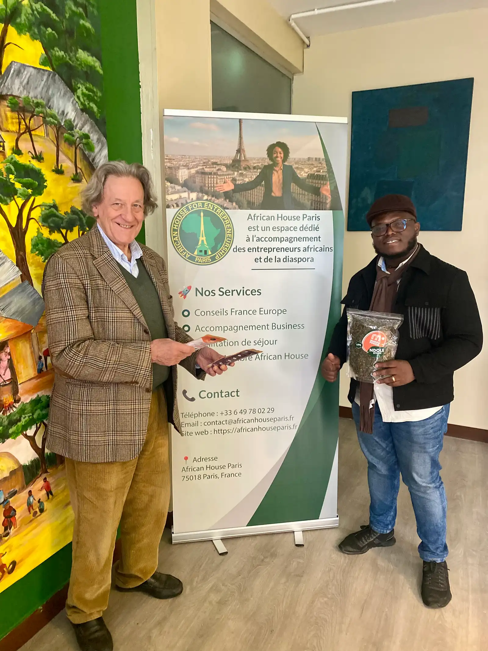 A Mumita representative presents a Mumita Foods Ndolé pouch at African House Paris